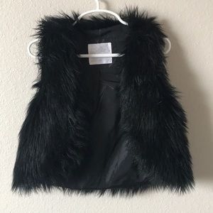 Black fur vest